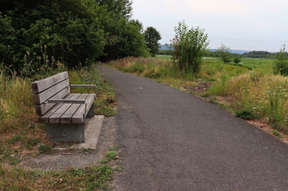 Bench at scenic view along Interlakes Trail